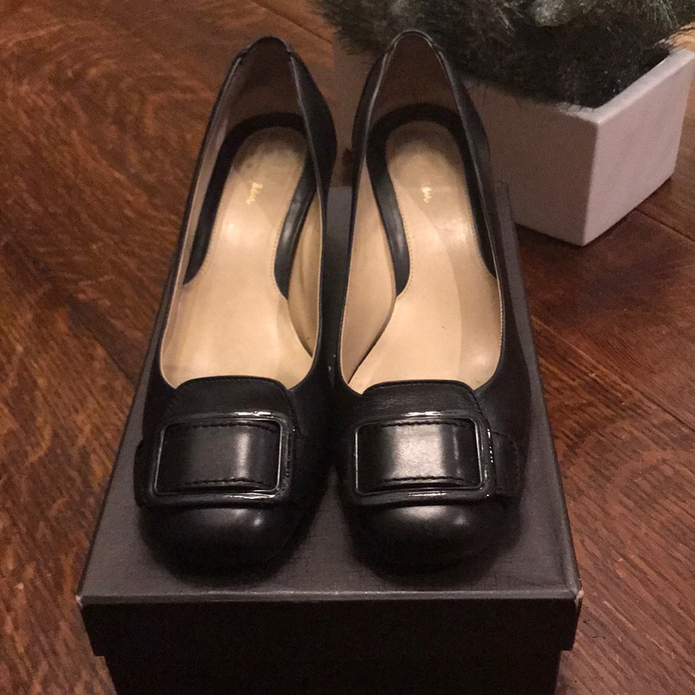 Black pumps. Worn/great condition.